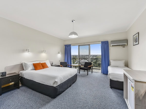 a spacious bedroom suite with a floor-to-ceiling window at Comfort Inn The Lakes Mount Gambier