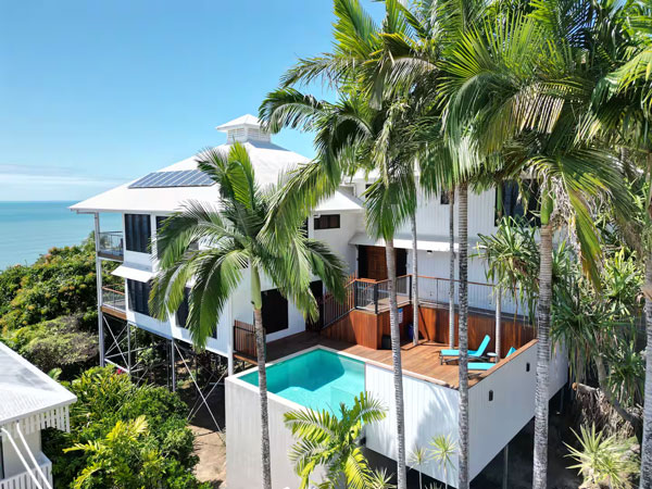 a Coral Sea View Airbnb in Cairns with a pool and balcony