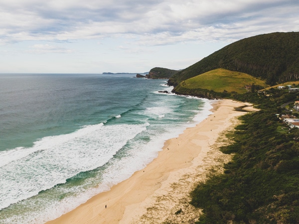 an aerial view of Blueys Beach, Barrington Coast