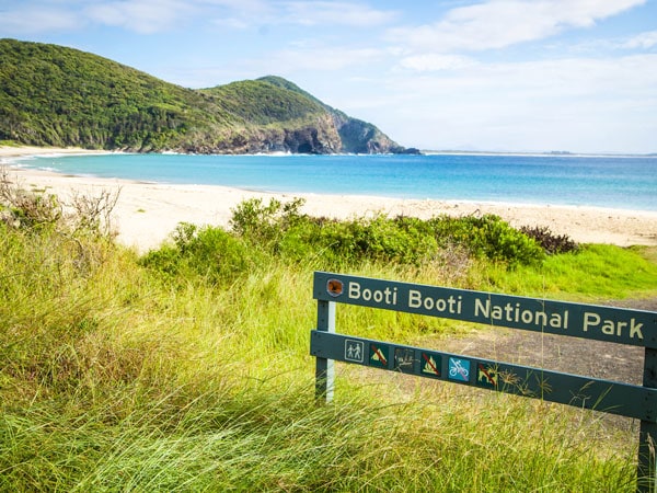 a stunning beach and grassy landscape at Booti Booti National Park