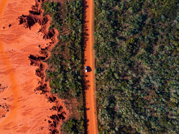 an aerial view of a car passing through James Price Point