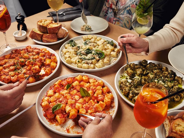 an array of food on the table at Mamma’s Boy Trattoria
