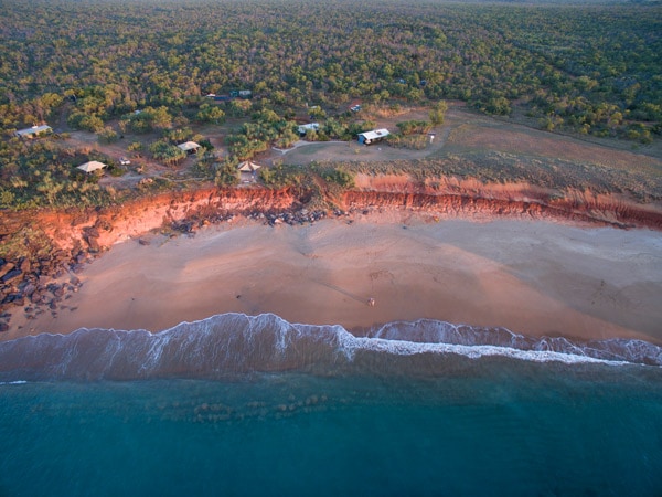 an aerial view of the beach at Mercedes Cove Exclusive Coastal Retreat