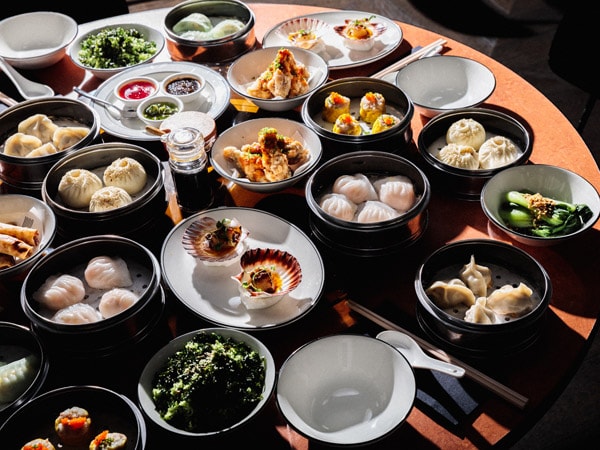 a table filled of Chinese dishes at Moonhouse Balaclava