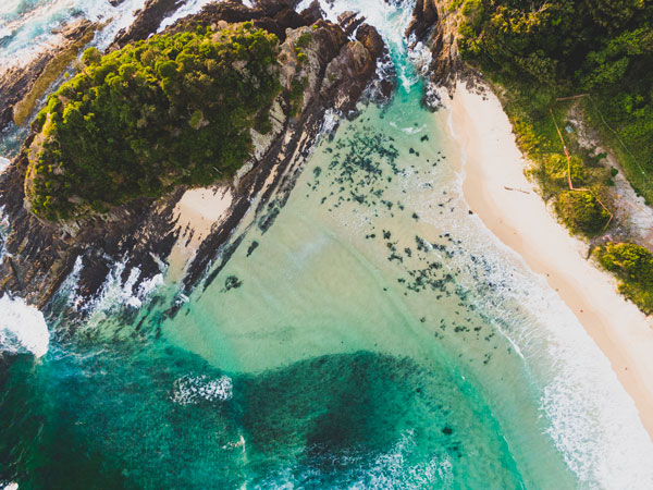 an aerial view overlooking the scenic waters off Number One Beach, Seal Rocks, Barrington Coast