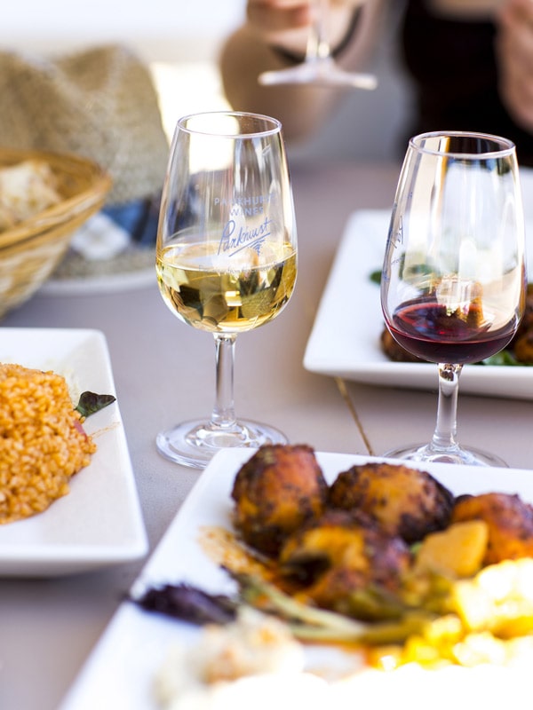 enjoying food and wine on the table at Pankhurst Wines, Canberra