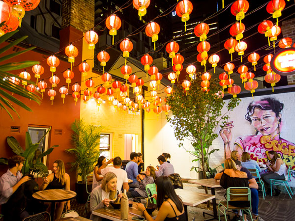 an al fresco courtyard festooned with lanterns at night, Spice Alley, Sydney