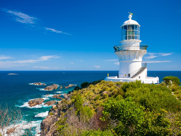 the Sugarloaf Point Lighthouse atop Sugarloaf Point, Seal Rocks