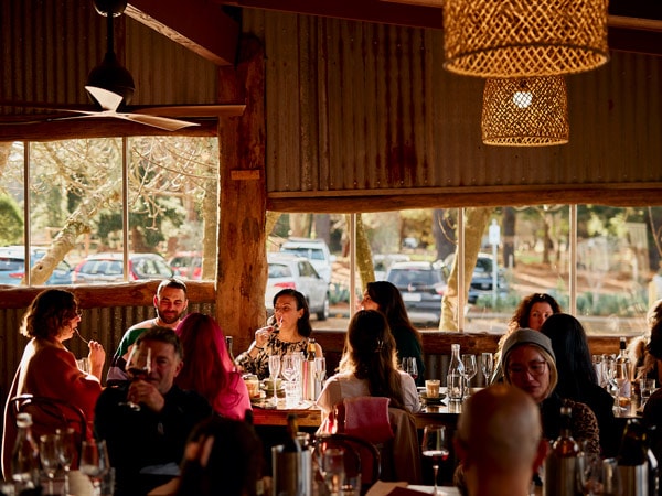 a group of people dining at T’Gallant Vineyard