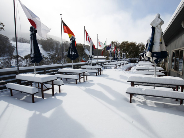 snow-covered tables at The Local Pub, Thredbo