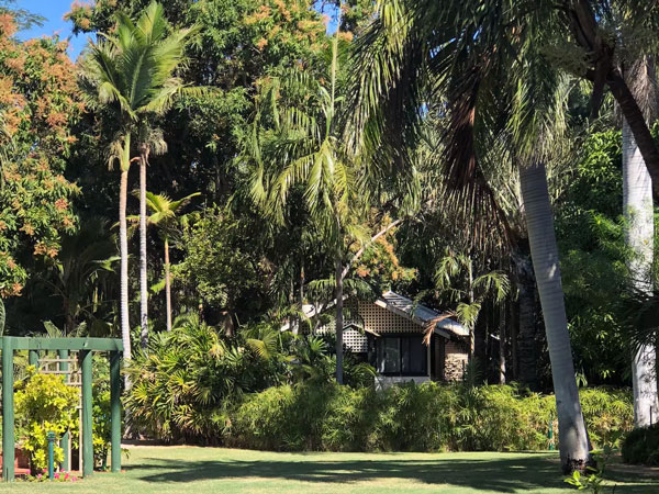 The Pearlers Cottage within lush greenery in Broome