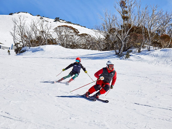 skiing in the slopes of Thredbo Resort