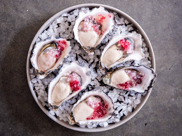 a plate of gourmet oysters at Bangalay Dining