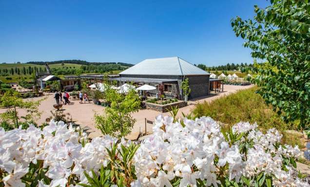 visitors enjoying the scenic grounds of Mayfield Gardens, Oberon