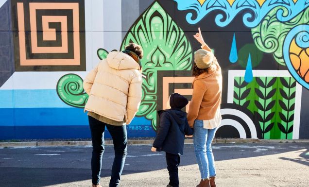 Family admire street art in Braddon Canberra
