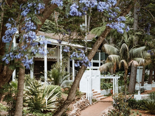 trees and flowers surrounding The Lodge Jamberoo