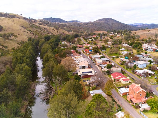 an aerial view of the Turon River and the town of Sofala