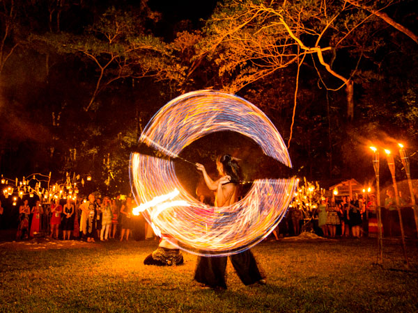 a fire dancer at Flames Of The Forest