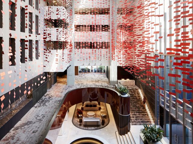 the three-storey Hotel Realm with red squares throughout