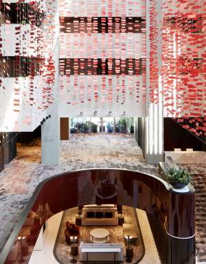 the three-storey Hotel Realm with red squares throughout