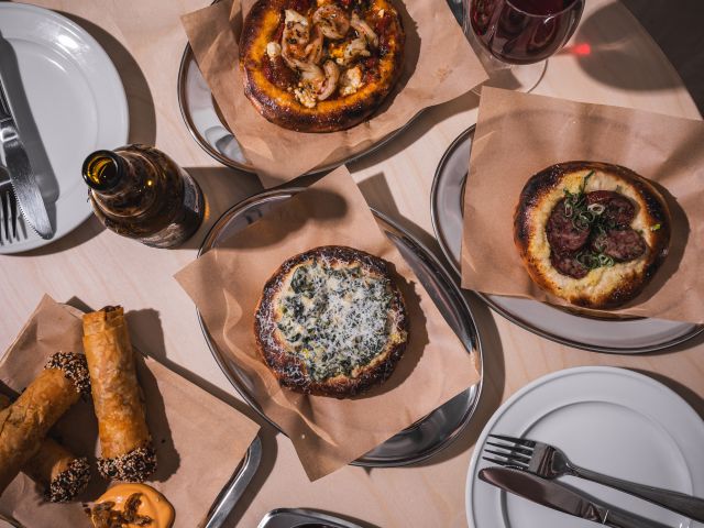 a table-top view of food at Homer Rogue Taverna, Cronulla NSW