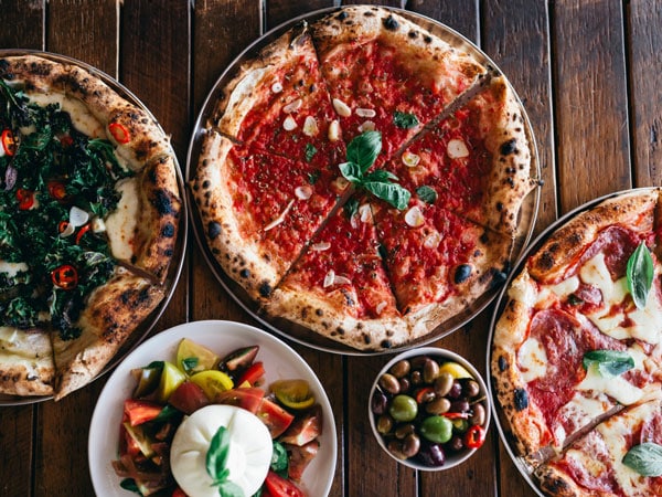 a table-top view of pizza at Barrels Pizza Restaurant