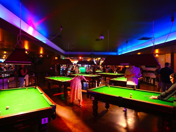 people playing at the pool tables in Downunder Bar, Cairns