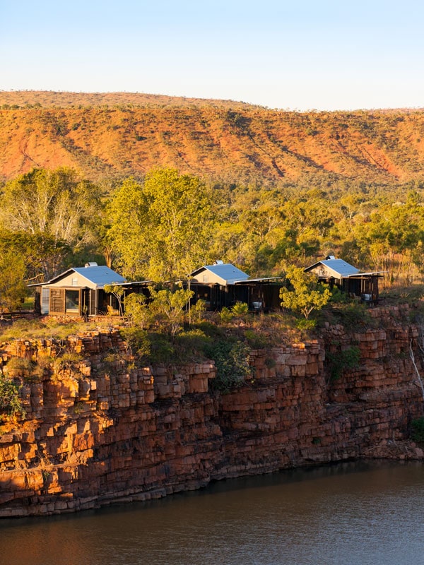 luxury lodges perched on the side of the cliff at El Questro Homestead
