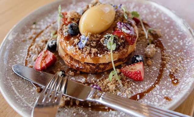 fluffy buttermilk pancakes on a plate at Goodfriends Eatery, Newcastle