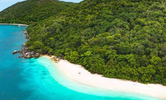 an aerial view of the turquoise waters of Nudey Beach