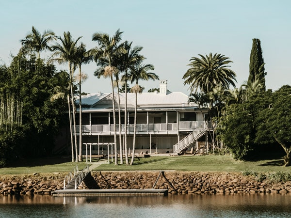 the Tweed River House by the side of the river
