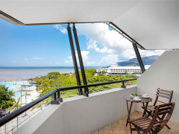 a balcony with views of the Cairns esplanade, Mantra Esplanade Cairns