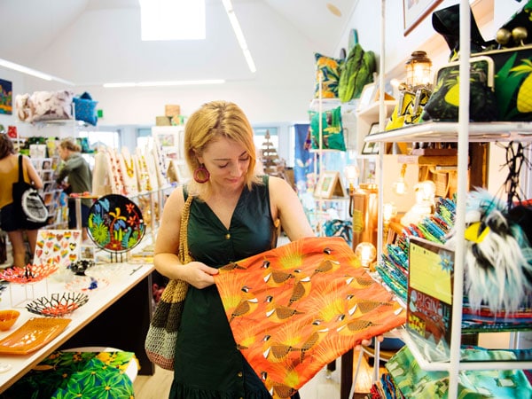 a woman browsing items at The Local