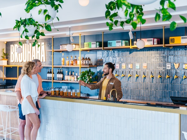 guests ordering drinks in a brewery during Sunshine Coast Craft Beer Tours