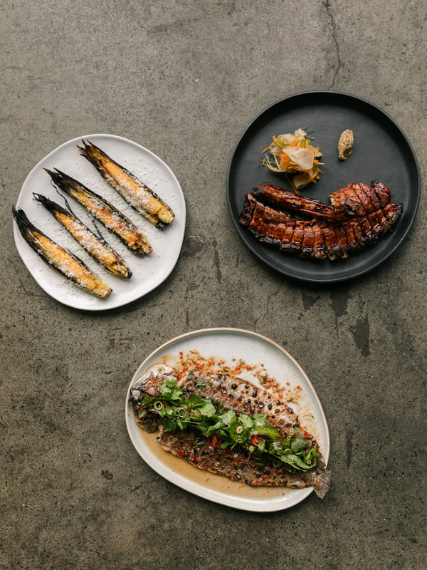 a table-top view of seafood meals at Rick Shores