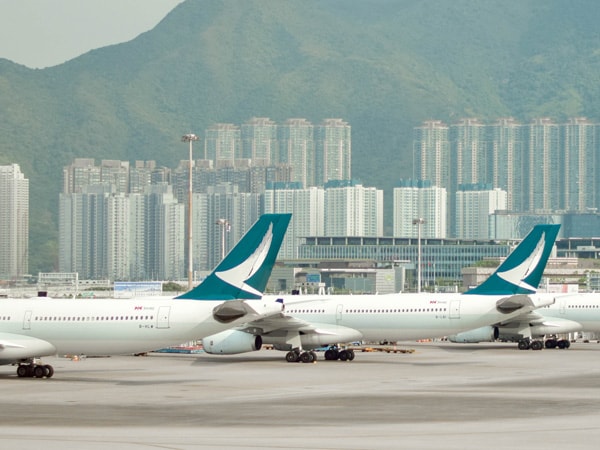 Cathay Pacific planes lined up on the runway