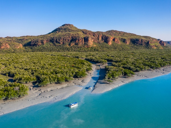 Coral Expeditions sailing across Hunter River