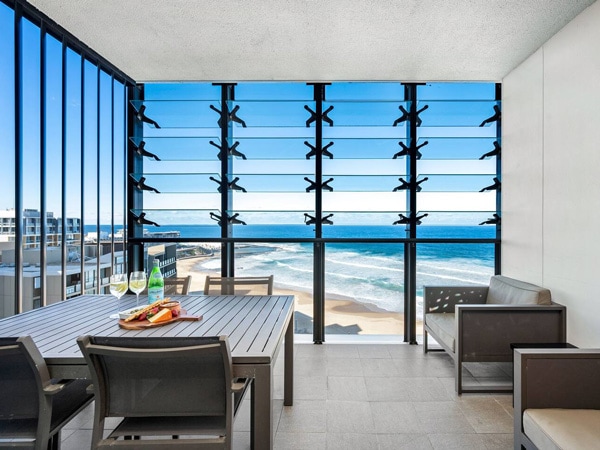 dining with views of Newcastle beach at Executive Beach Apartment