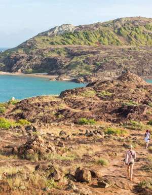 People walking to the northernmost tip of Australia in Cape York