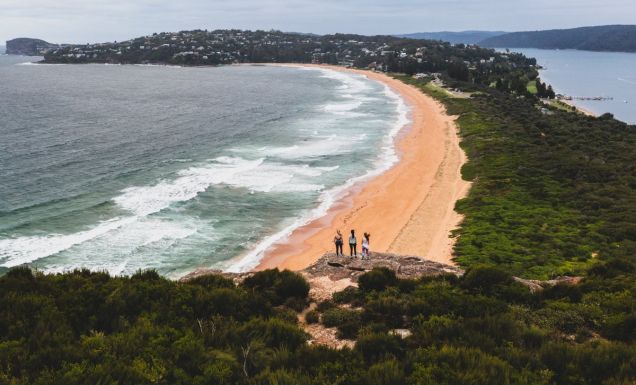 Women at the Palm Beach Lighthouse trail summit looking out over the views
