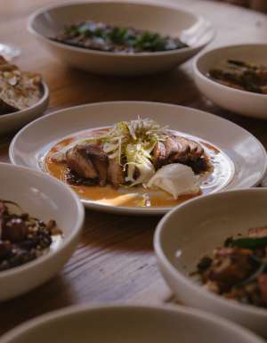 A variety of plates of food at Tempus
