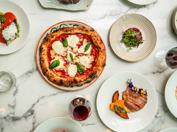 Margherita pizza and other dishes at Bottega Coco, Sydney NSW