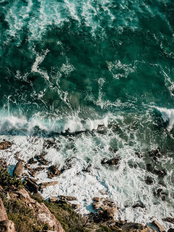 top view of waves crashing on the rocks in Tasmania