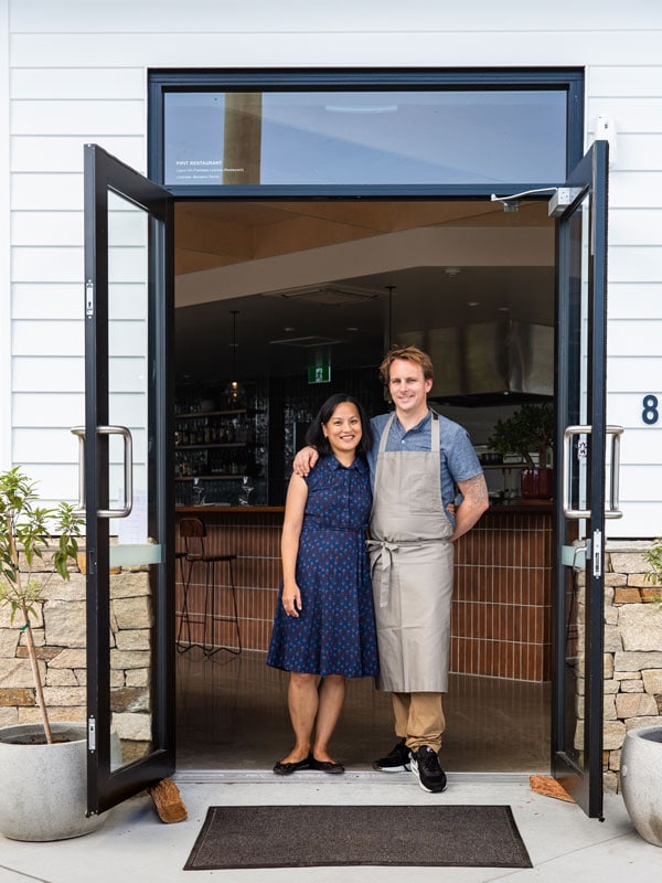 Ben and Yen Devlin standing side by side at Pipit Restaurant, Pottsville