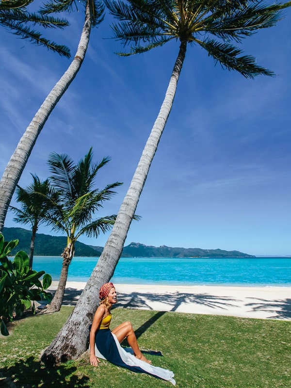 a portrait of fashion designer Sarah-Jane Clarke on the beach
