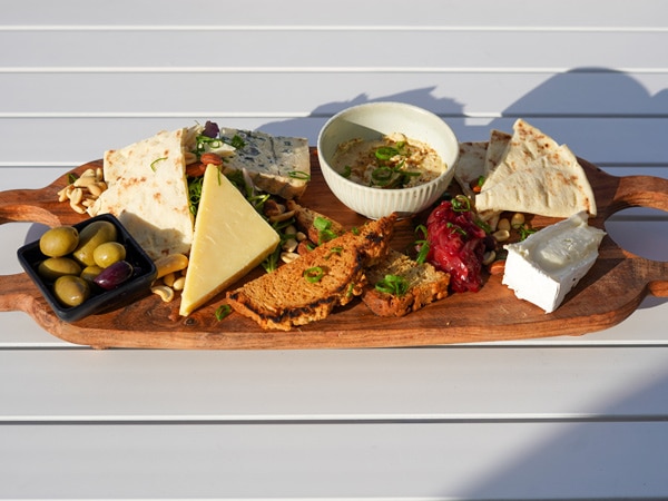 a cheeseboard served with pickles, chutney and crackers at Scarborough Harbour Brewing Co., Scarborough Qld