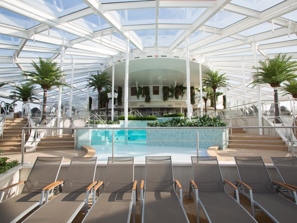 sunloungers by the pool onboard RCI Quantum of the Seas