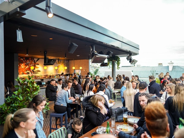 the rooftop bar at Telegraph Hotel, Hobart, Tas filled with people