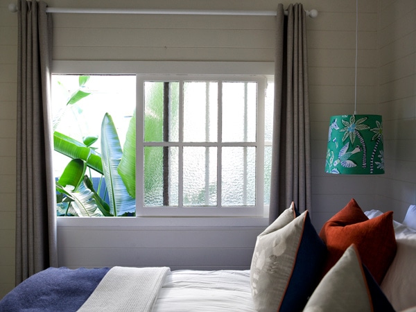 a bedroom in an apartment suite located at The BoathouseHotel, Patonga