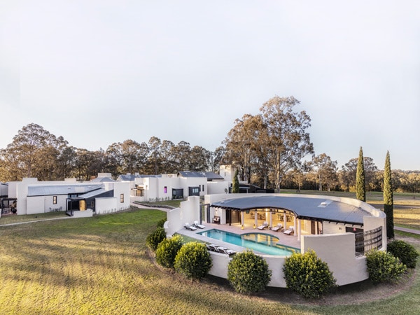 an aerial view of the outdoor pool at Tower Lodge